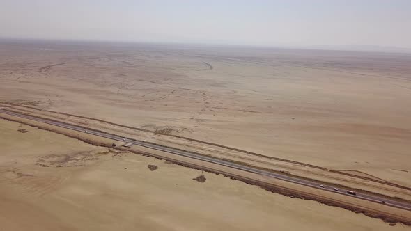 Dusty Highway on the Oriental, Yellow Desert in Iran