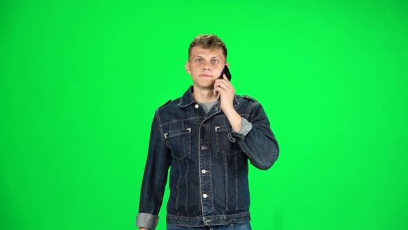 Smiling Man Goes and Talks on the Phone, Chroma Key. Slow Motion
