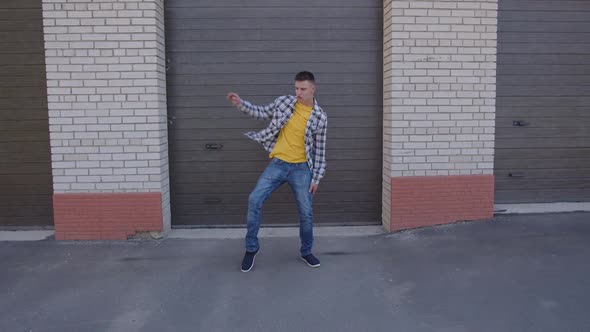 Fast Moves of Young Man Who Dancing