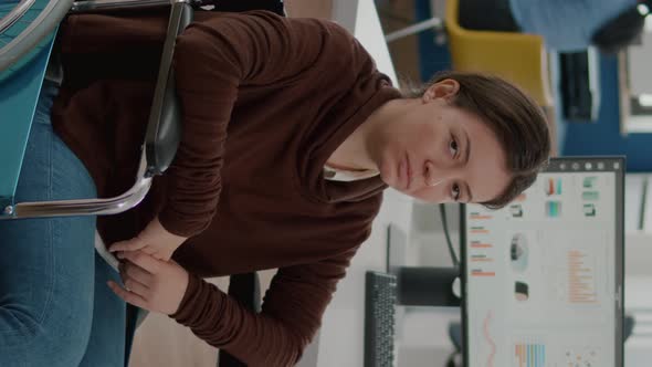 Video Vertical Portrait of Immobilized Paralyzed Tired Woman Looking at Camera