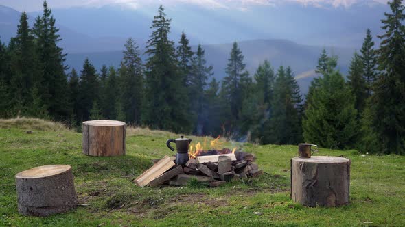 Bonfire and Coffee Maker in the Mountains