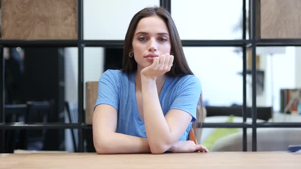 Thinking Young Woman