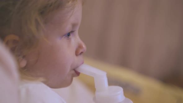 Pretty Girl Uses Inhaler to Cure Bronchitis on Soft Bed