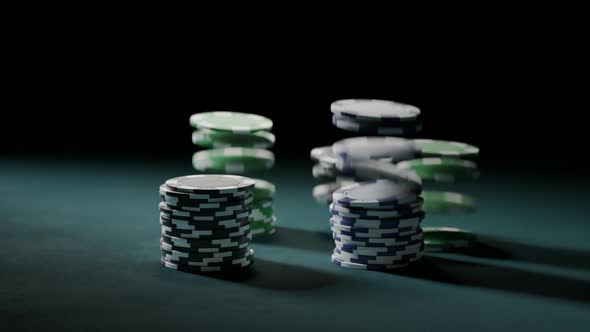 Casino chips or tokens forming stacks on a green gaming table. Winning. 4k