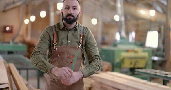 Handsome Carpentry Worker in the Joinery Manufacturing