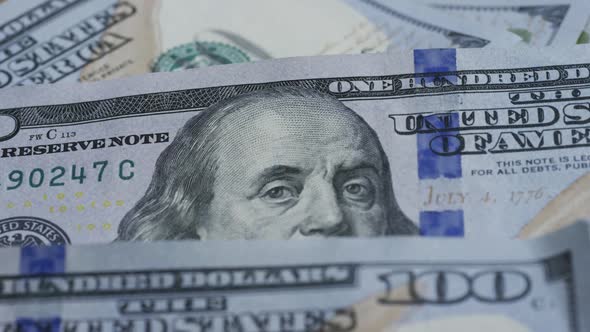 Rotating stock footage shot of $100 bills - MONEY 0130