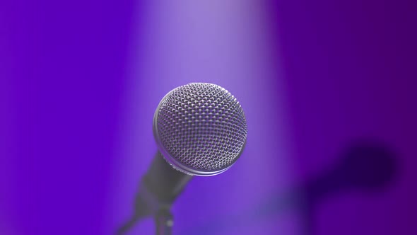 Concert Microphone on the Music Hall Stage in the Stage Lights and Spotlight alt