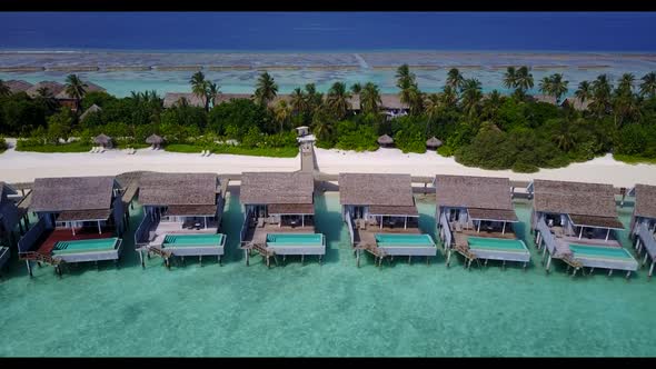 Aerial top view nature of beautiful bay beach wildlife by clear ocean with clean sandy background of