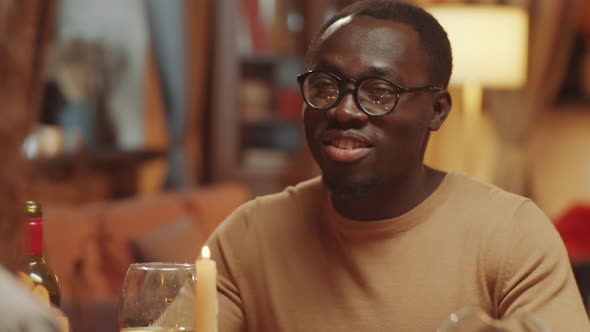 Black Man Drinking Wine And Chatting