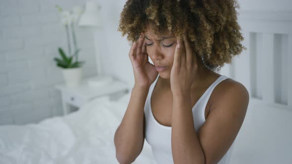 Woman Suffering From Headache