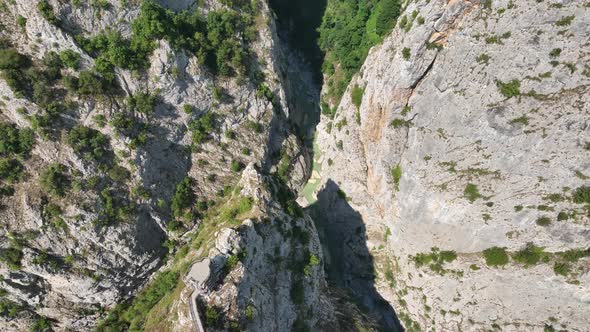 Deep Valley Canyon And Flowing River