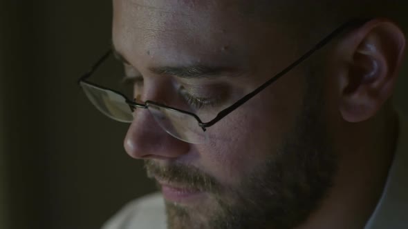 Handsome Man Working on Computer at Night