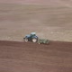 Tractor Plows the Field. Preparation of Soil For Sowing - VideoHive Item for Sale