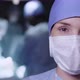 Young female doctor standing in operation room - VideoHive Item for Sale