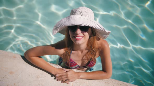 Woman In The Pool