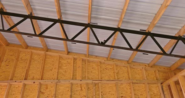 Building Frame Composition Ith Timber Joists Roofing Panels in Construction Site