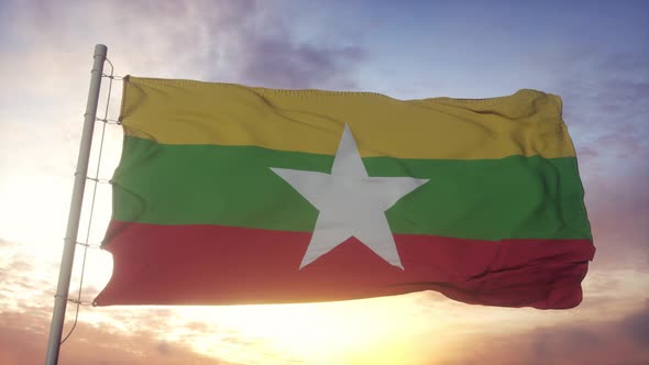 Flag of Myanmar Waving in the Wind Sky and Sun Background