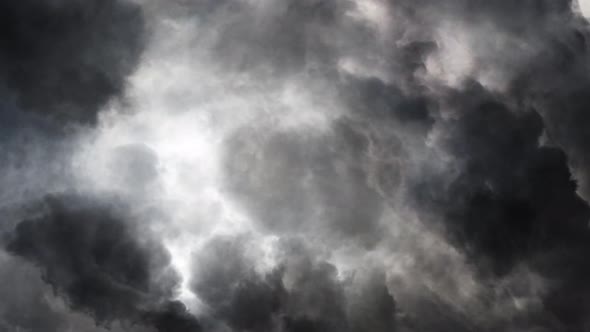 4k Gray white cumulonimbus clouds moving in the sky, point of view