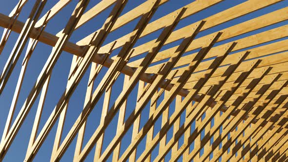 Looping shot with the camera moving along the unfinished wooden roof truss.