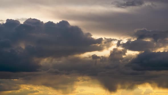 Stormy Clouds Move Smoothly in the Red Sky at Sunset. Timelapse. Cloud Space.