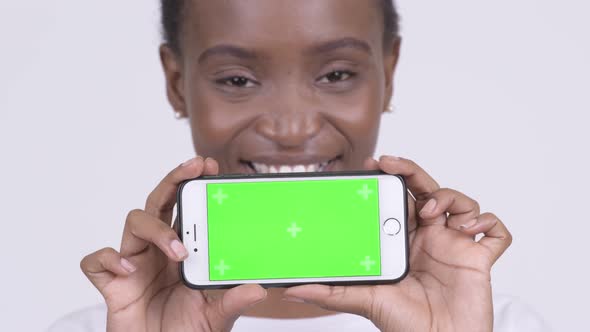 Face of Happy Young Beautiful African Woman Showing Phone