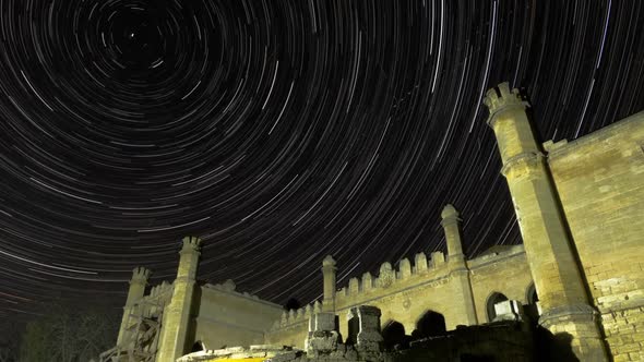 Star Trails Over Scenic Abandoned Ruin of Building