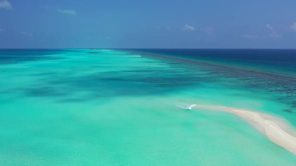 Aerial tourism of tranquil sea view beach holiday by blue sea with white sand background of a dayout