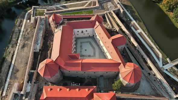 Aerial drone view of the Fagaras, Romania. Fagaras Citadel surrounded by a moat
