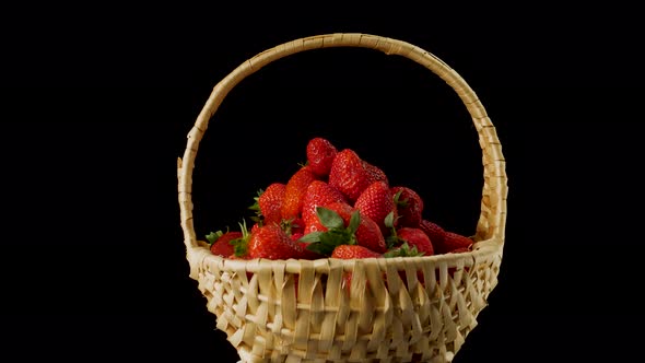 Fresh tasty raspberry in the basket turns on plate