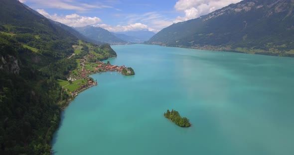 Aerial travel drone view of Iseltwald, Lake Brienz, Switzerland.