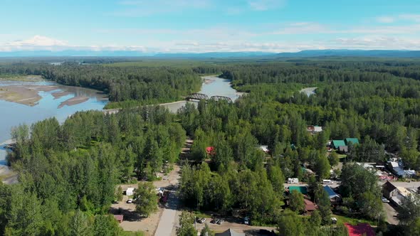 4K Drone Video of Talkeetna, AK Village along the Susitna River with Mt. Denali in distance on Sunny