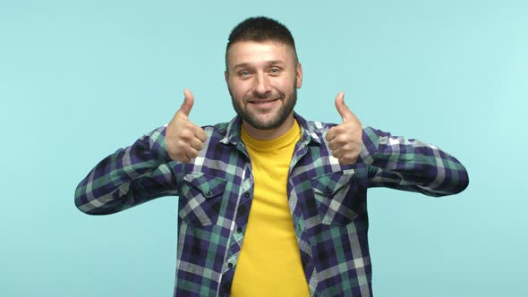 Slow Motion of Attractive Middleaged Man with Beard and Blue Eyes Wearing Casual Clothes Raising