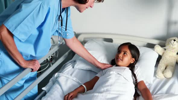 Female doctor interacting with patient