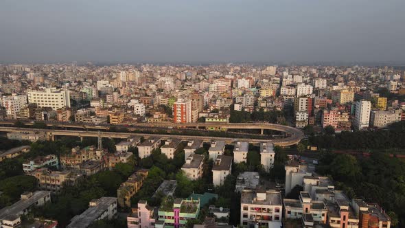 Big highway in middle of Dhaka city. Aerial view metropolis transport