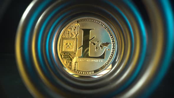 Gold Litecoin in the Center of Tunnel with Cold and Warm Light. Blockchain Technology. Crypto