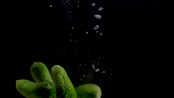 Cucumber Slow Motion Closeup Falling in Water