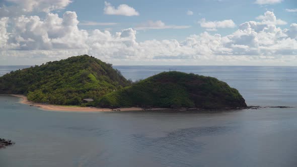 Stunning peninsula with green lush forest and tropical sea around, Fiji Islands