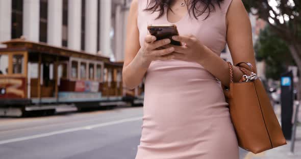 Young woman on the go in the city