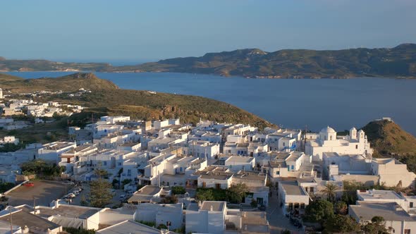 Panoramic View of Plaka Village with Traditional Greek Church. Milos Island, Greece