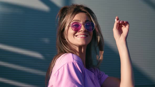 Female Street Dancer Smiling Performing Freestyle Movement