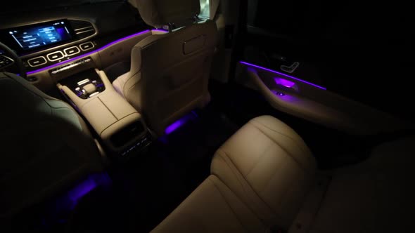 Premium SUV Interior with Wood Trim Ambient Atmospheric Lighting at Night