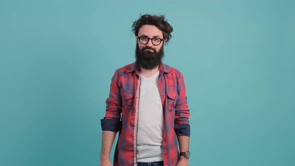 Portrait of Annoyed Man Making Face Palm Gesture Feeling Bored