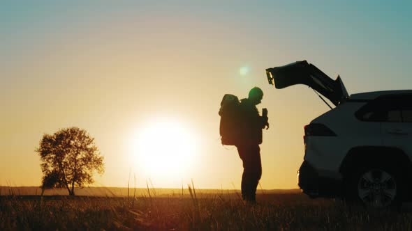 Silhouette Hiker Man Travelling Alone with Backpack. Travel Concept