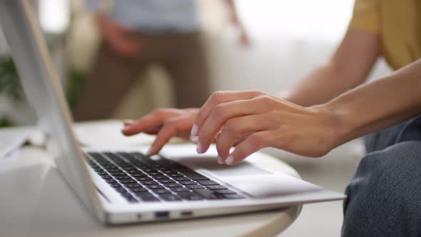 Unrecognizable Woman Working on Laptop from Home