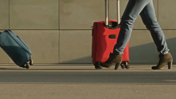 Feet of Different People Hurrying About Their Business in an Underpass at a Train Station or in the