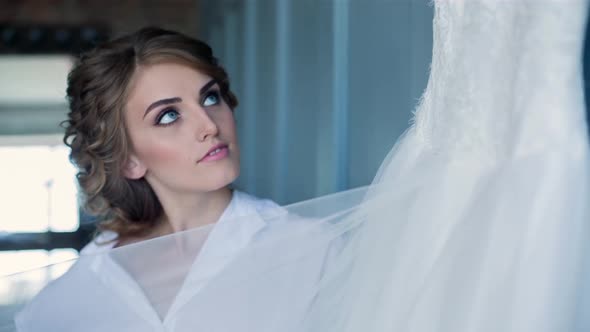 Bride is Watching a Wedding Dress