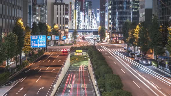 Timelapse Of Traffic At Night With Cityscape Buildings From Yurikamome Shimbashi Station Connecting