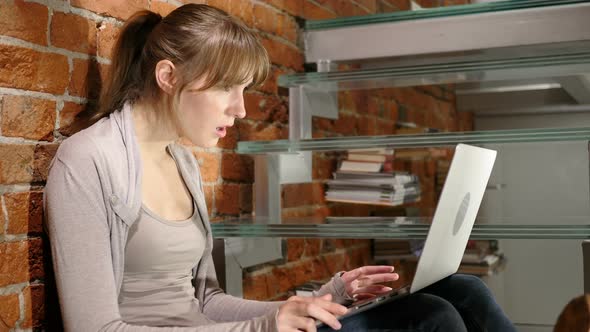 Angry Frustrated Young Woman Working on Laptop