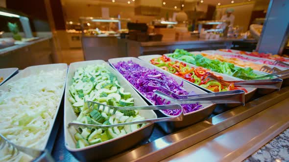 Salad, vegetables bar on self-service luxury hotel