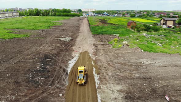 Special transport movement. The bulldozer leveled the ground.